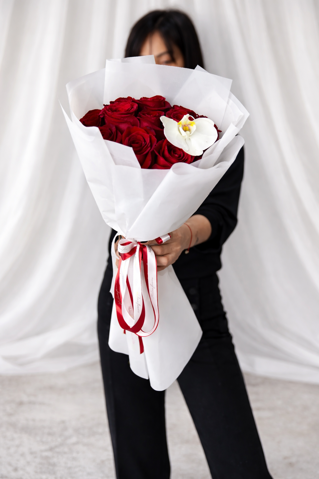 Dozen Red Roses with an Orchid